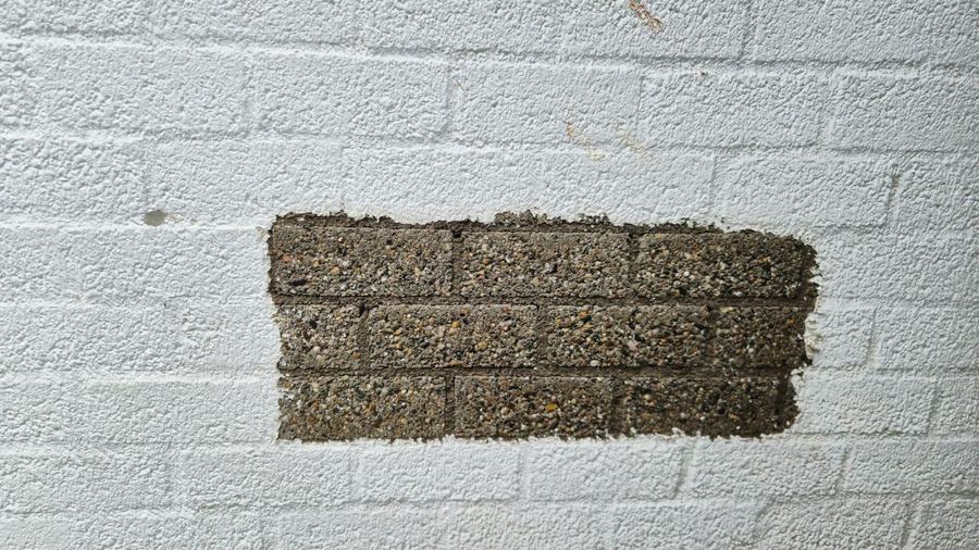 Verf verwijderen van gevel